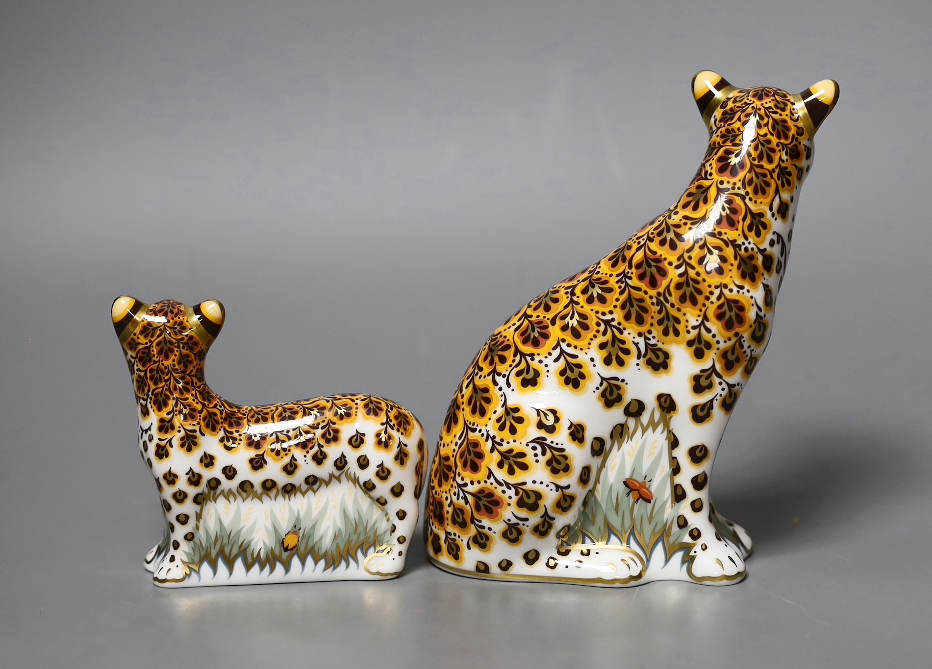Two Royal Crown Derby paperweights - Leopardess, gold stopper, boxed with certificate and Leopard Cub, gold stopper, boxed with certificate